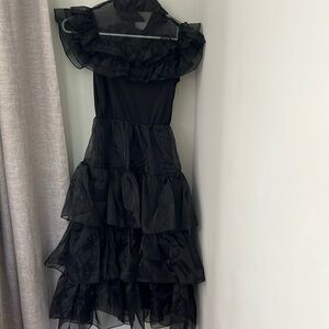 Wendy’s costume from Adam’s Family. Size